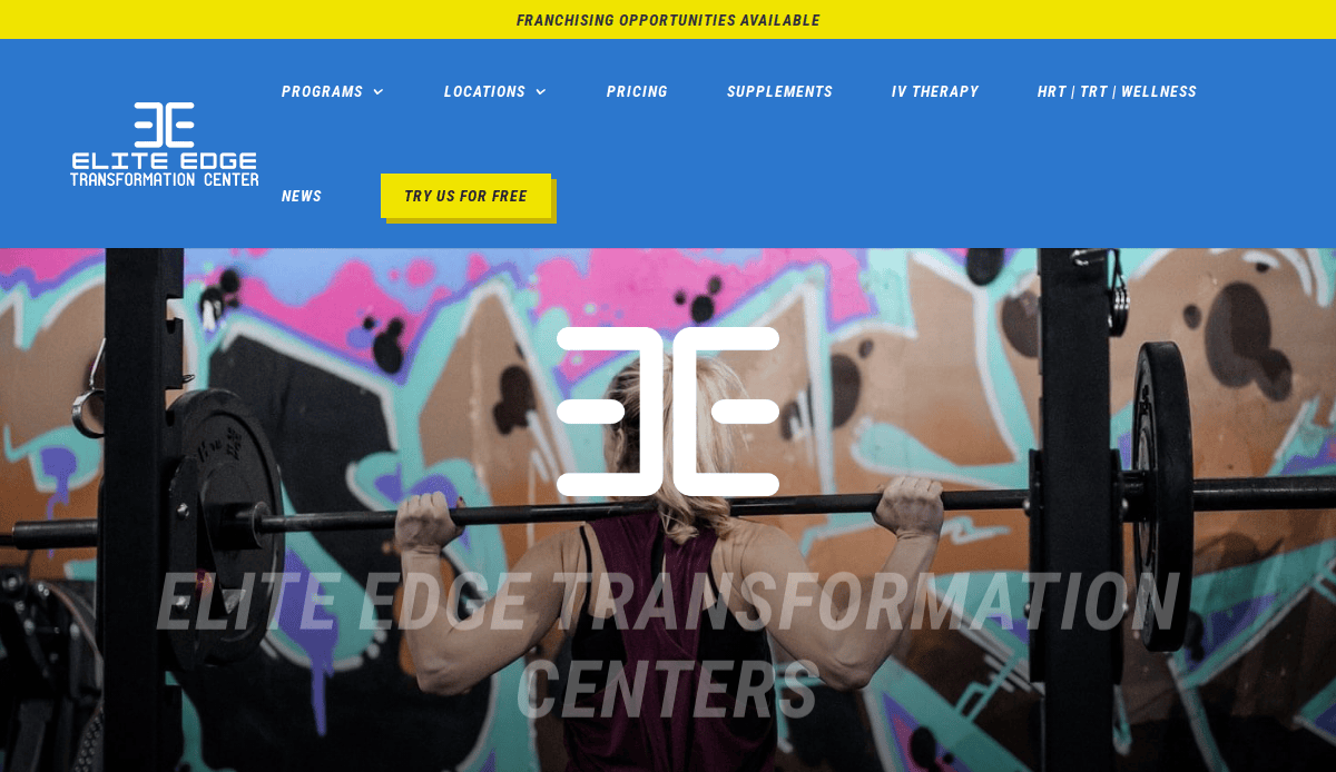 A person lifts a barbell in a gym with colorful graffiti on the wall. The Elite Edge Transformation Center logo and navigation menu are displayed over the image.