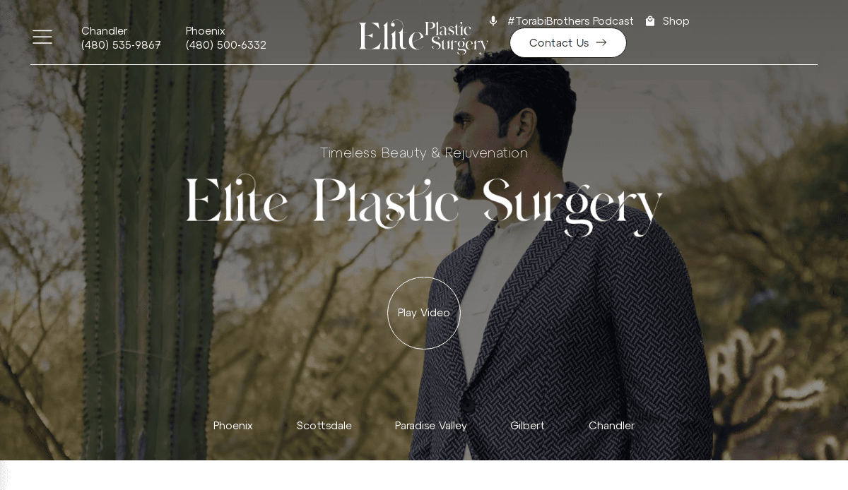 A man in a patterned suit stands outdoors next to a tall cactus, looking to the side. The website header reads Elite Plastic Surgery, with contact info and menu options visible at the top.
