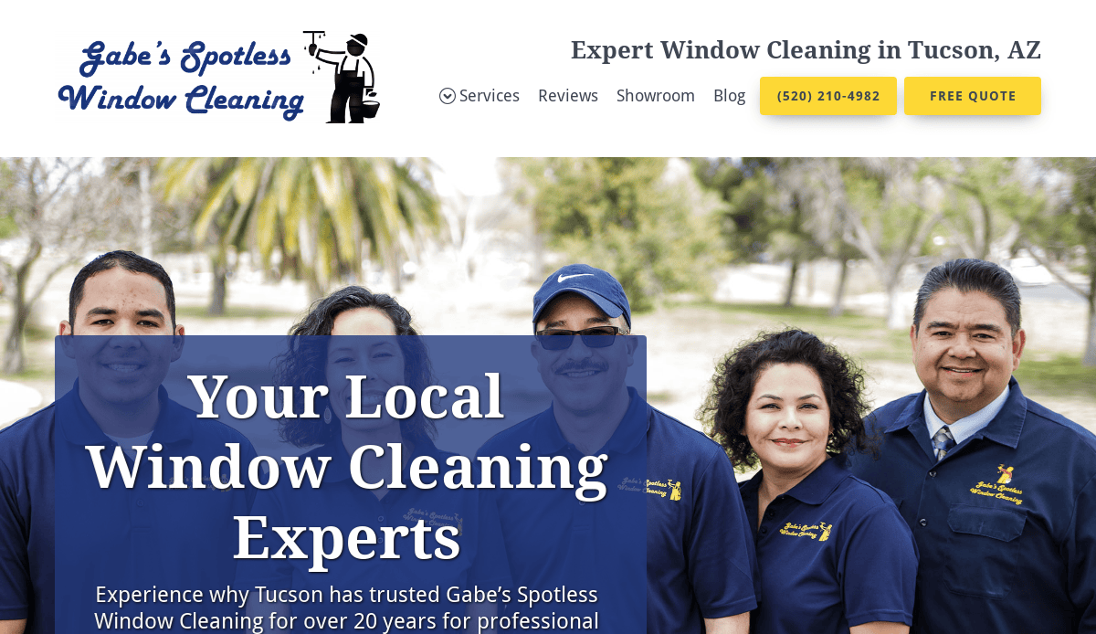 Four smiling people in navy blue shirts pose outdoors in front of trees. The website header reads “Gabe’s Spotless Window Cleaning” with a logo, navigation menu, contact number, and “Free Quote” button.