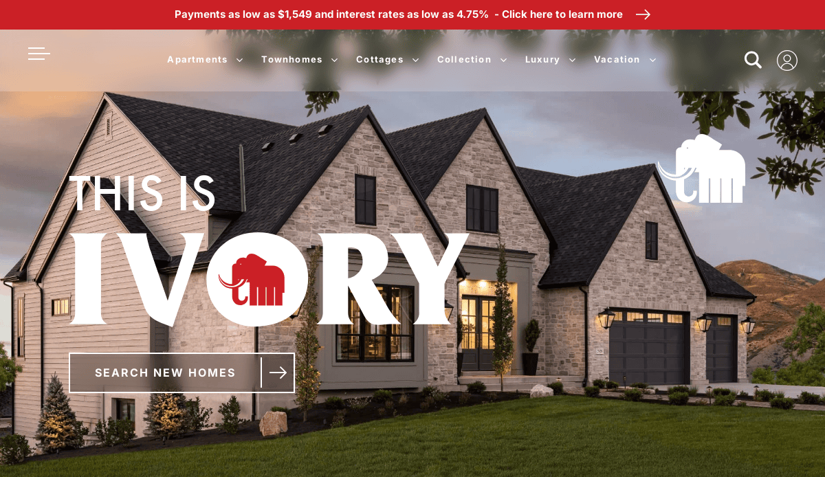 Modern stone and siding house at sunset with manicured landscaping. Text reads “This is Ivory” with an ivory tusked red elephant logo, and a button says “Search New Homes.” A red banner highlights special payment and interest rates.