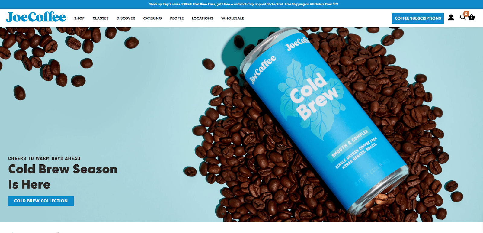 A can of JoeCoffee Cold Brew lies on a surface surrounded by scattered coffee beans, with the JoeCoffee website header and navigation menu visible at the top of the image.