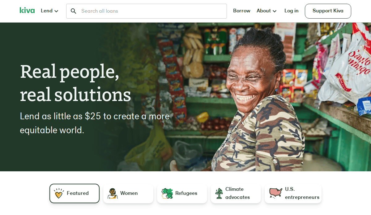 A smiling woman stands in front of a small shop with shelves of colorful goods. Text reads: Real people, real solutions. Lend as little as $25 to create a more equitable world. Icons for loan categories are below.