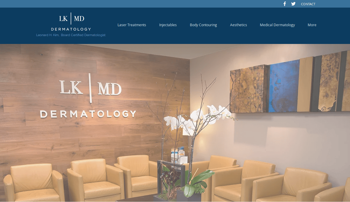 Dermatology office waiting area with tan chairs, a wooden wall displaying LK MD DERMATOLOGY, a white orchid on a table, and abstract art on the wall. Blue navigation bar is visible at the top.