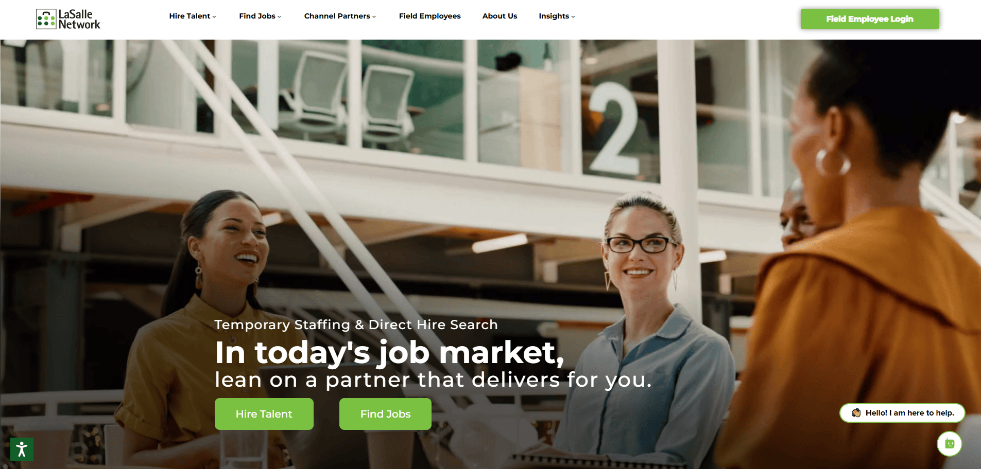 Three women smile and talk in a modern office with large windows and the number 2 visible in the background. The text promotes staffing and hiring services, with green buttons for Hire Talent and Find Jobs.