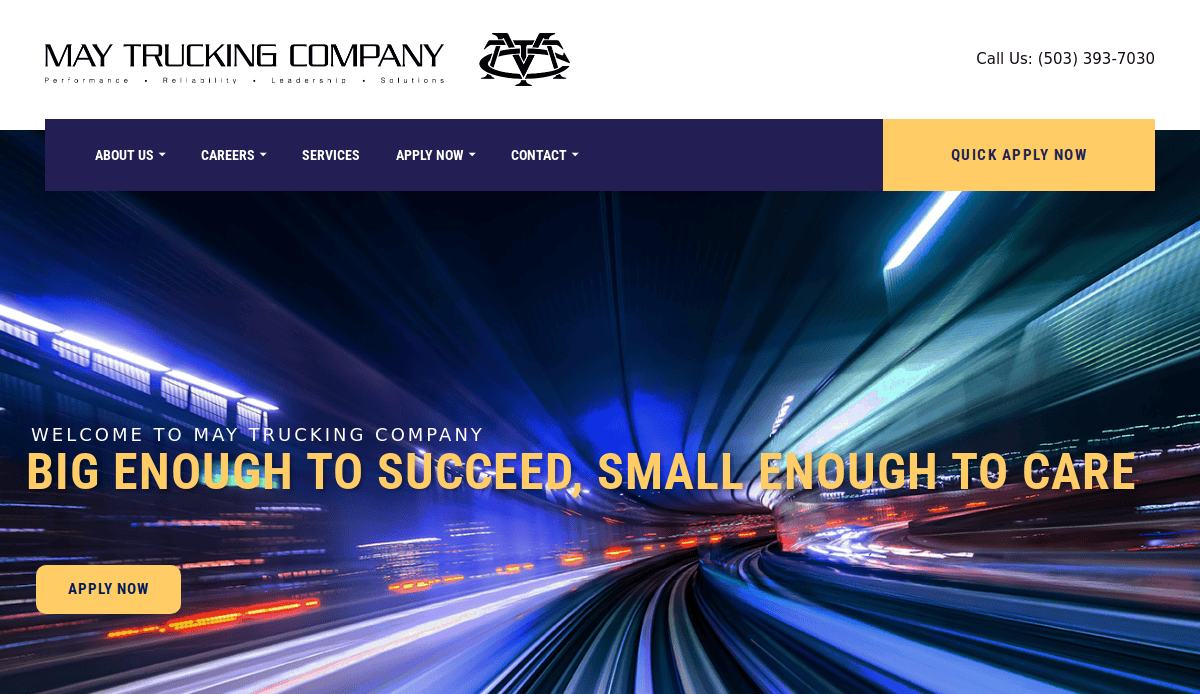 Website homepage for May Trucking Company, featuring a stylized image of highway lights at night, navigation menu, company slogan Big enough to succeed, small enough to care, and prominent Apply Now buttons.