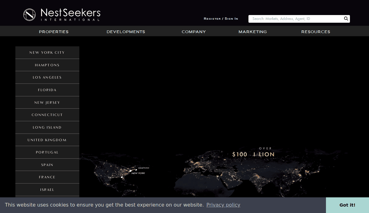 A dark-themed real estate website homepage displays a world map at night, highlighting illuminated cities. The top menu lists property locations, and the Nest Seekers International logo appears at the top left.