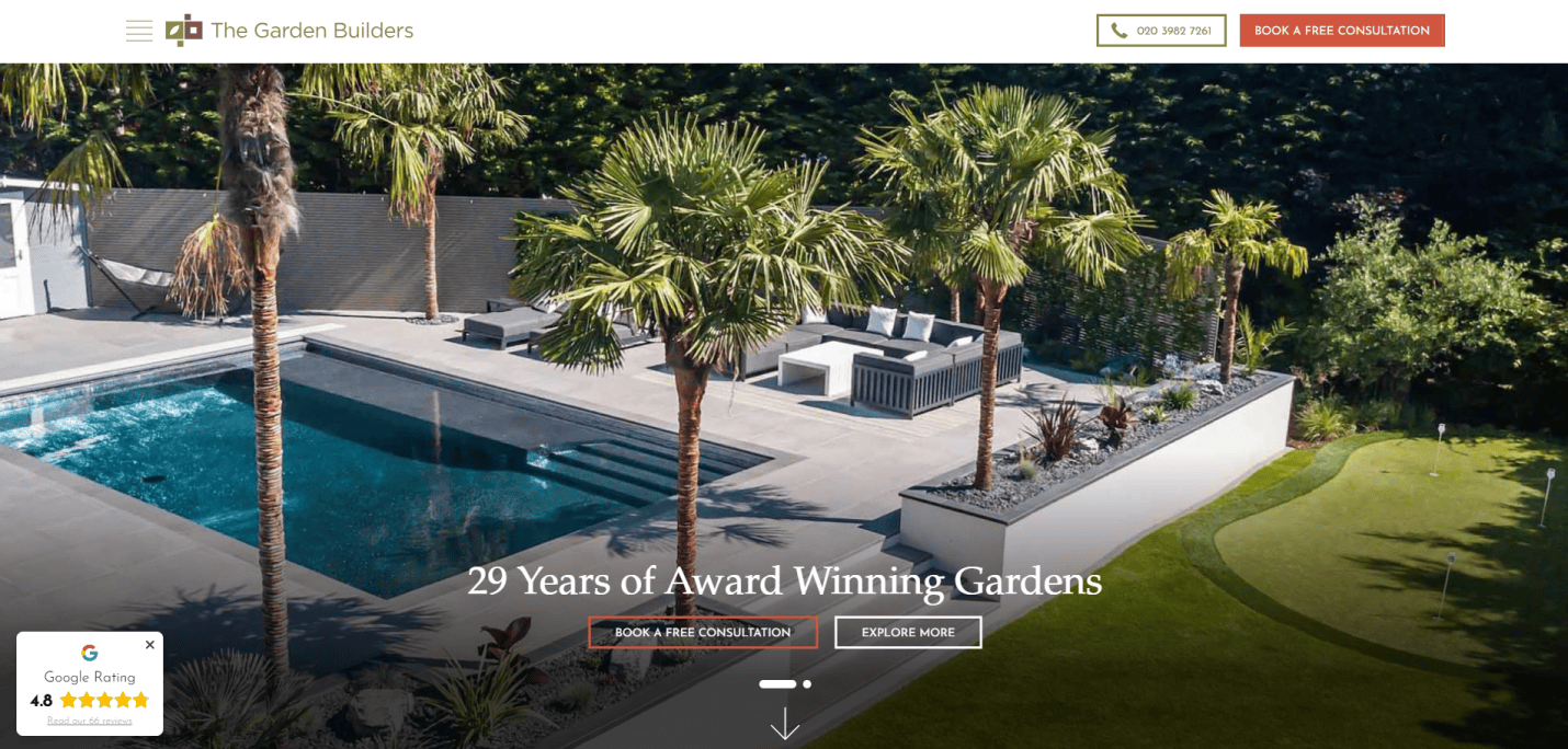 Modern garden with a swimming pool, palm trees, outdoor seating, and manicured lawn; website header for The Garden Builders with tagline “29 Years of Award Winning Gardens,” plus buttons for free consultation and expert lawn maintenance.
