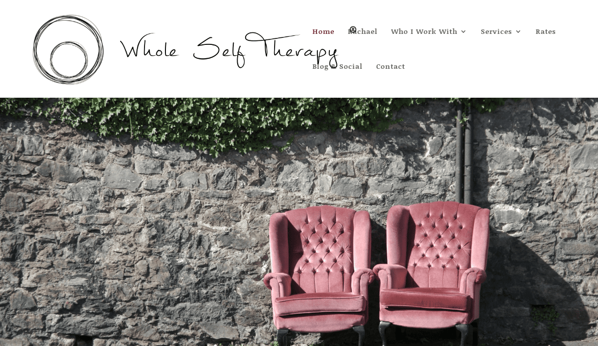 Two pink armchairs sit side by side in front of a stone wall covered partly in green ivy, creating an inviting scene on this wellness website’s homepage featured by Whole Self Therapy.
