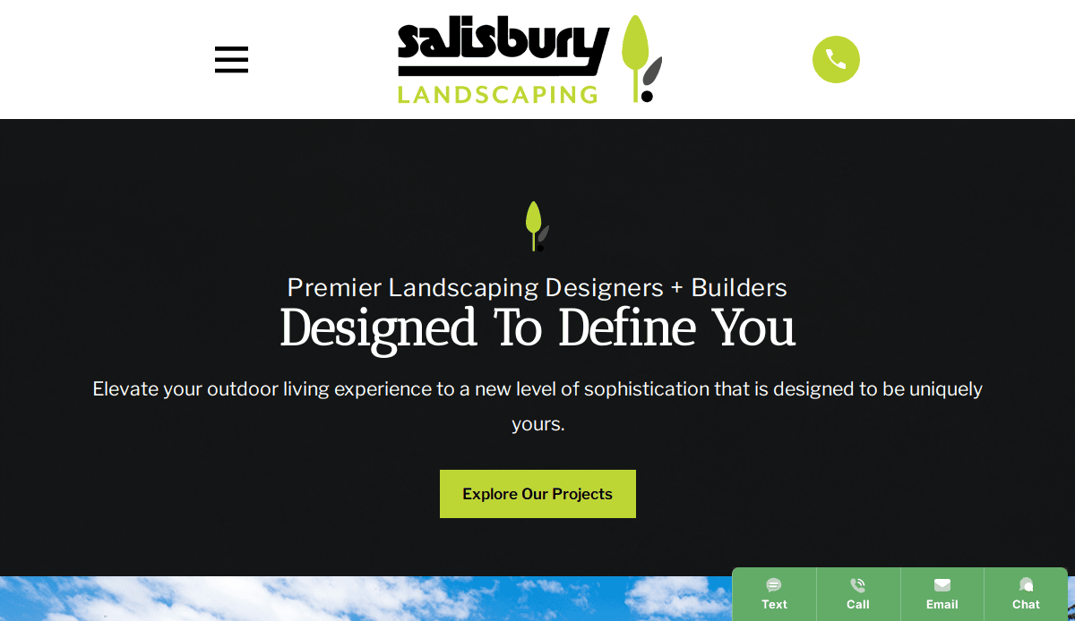 Screenshot of Salisbury Landscaping website homepage featuring the company logo, navigation menu, tagline Premier Landscaping Designers + Builders Designed To Define You, and an Explore Our Projects button. Expert in landscape design and comprehensive lawn care.