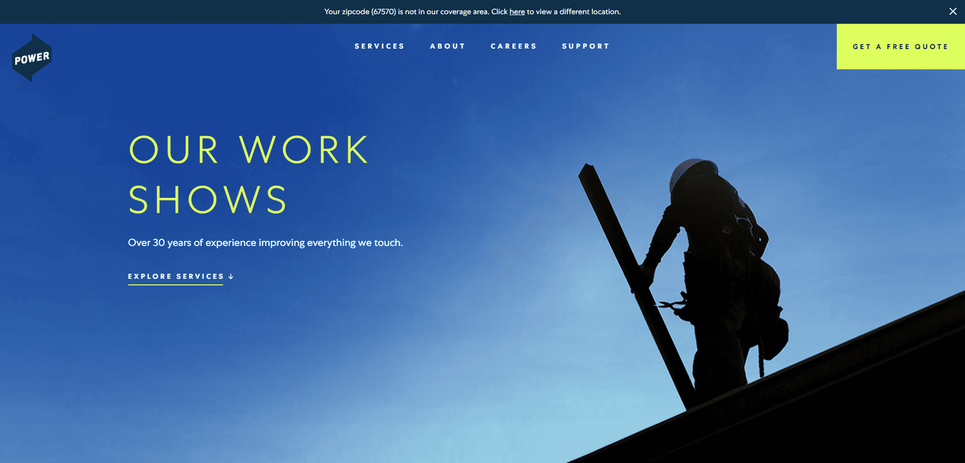 A silhouetted worker carries a plank on a rooftop against a blue sky. Text reads, OUR WORK SHOWS. Over 30 years of experience improving everything we touch. Navigation and a yellow Get a Free Quote button are visible.