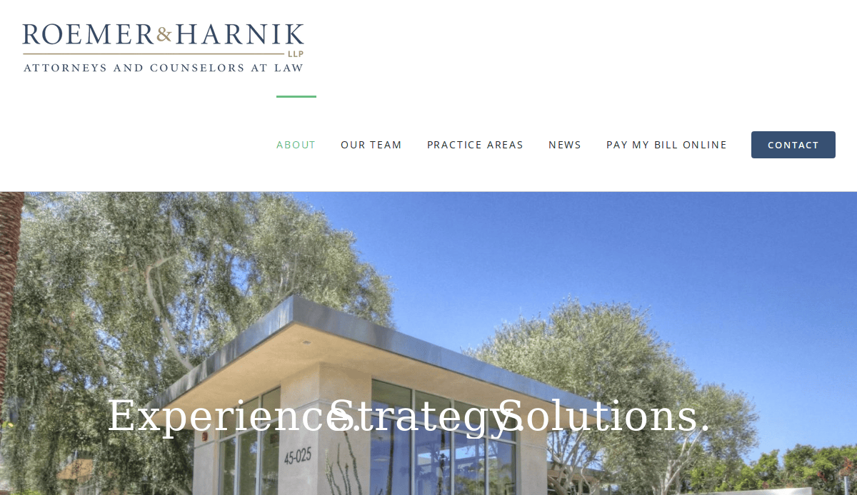Screenshot of the Roemer & Harnik law firm website homepage, showing their logo, navigation menu, and a building with trees in the background. Large text reads, Experience. Strategy. Solutions.