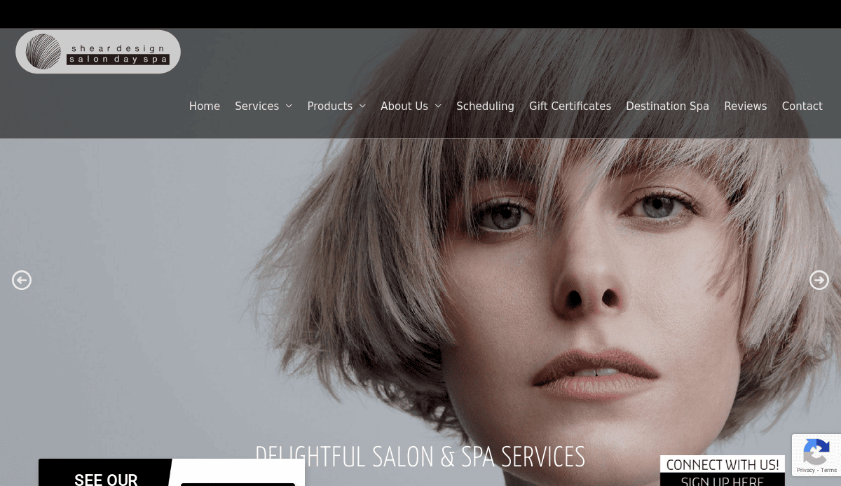 Homepage of Shear Design Salon & Day Spa website featuring a close-up of a woman with short, light-blonde hair and bangs. The menu bar at the top lists services, products, scheduling, and more.