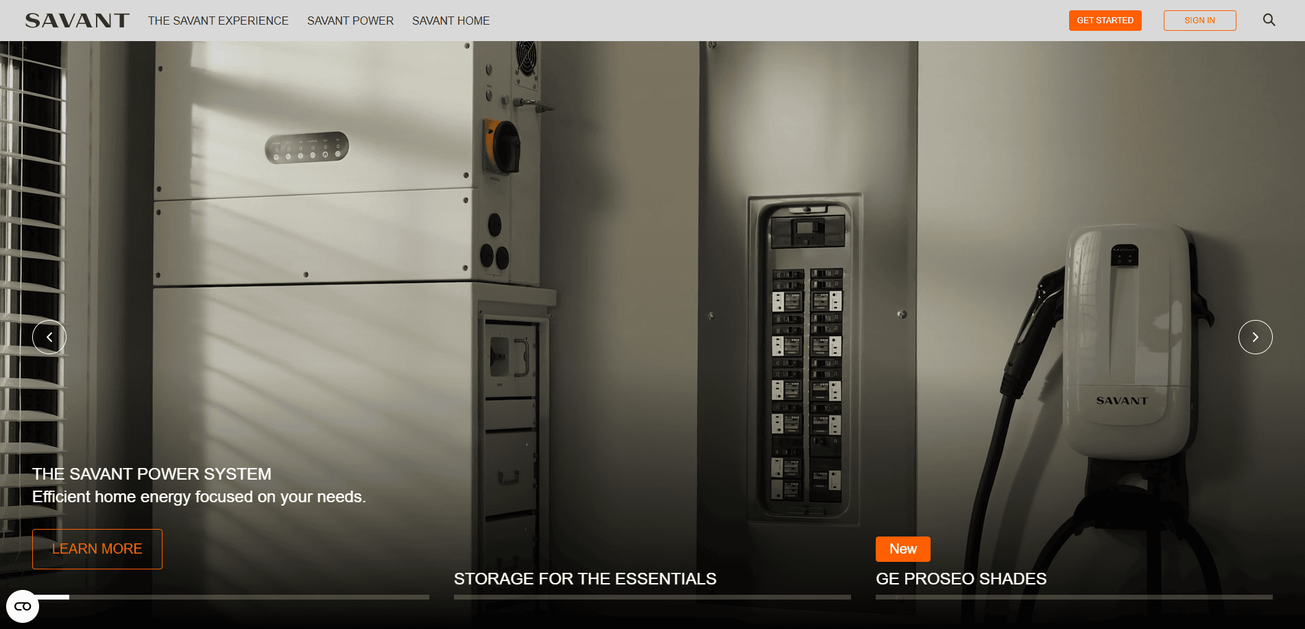 A modern home power system setup includes an electrical panel, energy storage unit, and a wall-mounted GE Proseco Shades charging device in a well-lit utility area. On-screen text highlights storage and smart shade features.