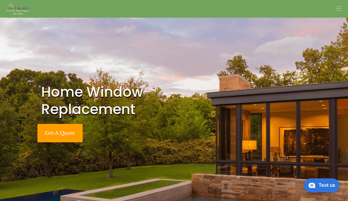Modern house with large glass windows and a pool, surrounded by trees. Text reads Home Window Replacement with a button labeled Get A Quote. A Text us chat button is at the bottom right.