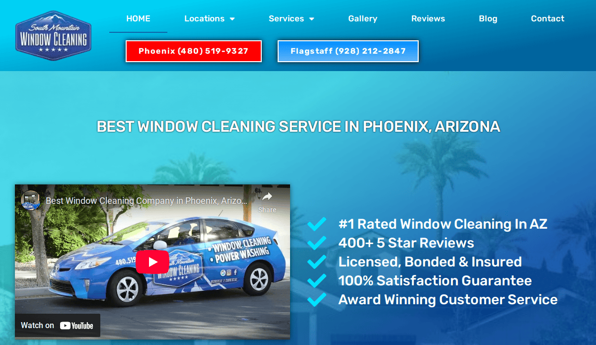 Screenshot of a window cleaning service website. A promo video and a car with company branding are displayed. Contact numbers for Phoenix and Flagstaff are at the top. Service benefits are listed on the right of the video.