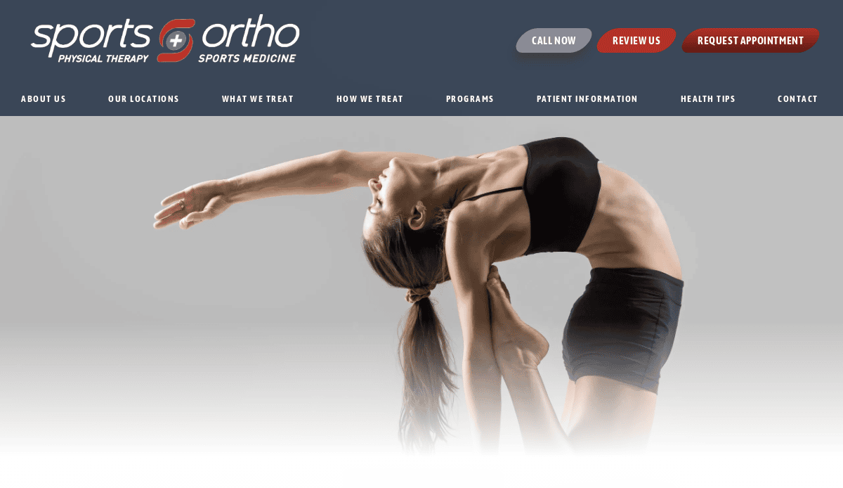 A woman in athletic wear performs an advanced yoga pose, arching her back and grabbing her foot. The image is featured on a sports medicine and physical therapy clinic website.