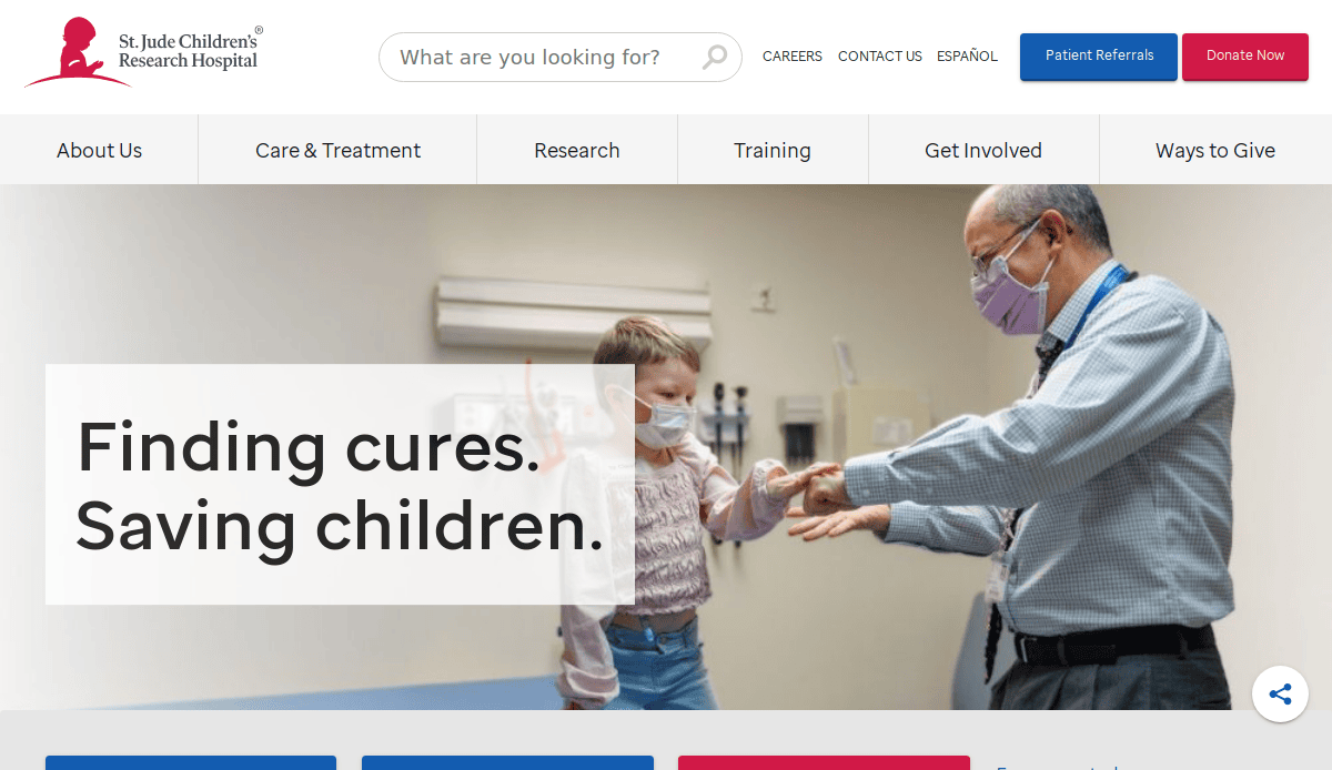 A healthcare professional in a mask examines a smiling child patient in a medical setting. Large text reads Finding cures. Saving children. on the St. Jude Children’s Research Hospital website.