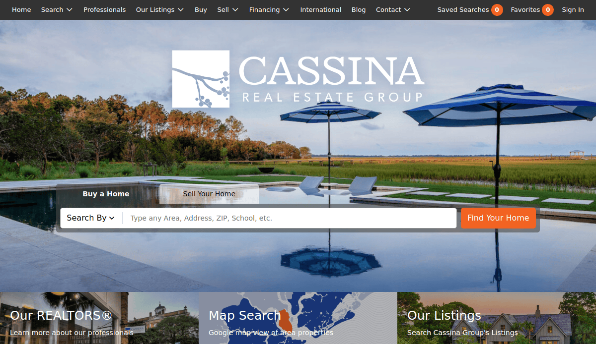 A real estate website homepage with a poolside view, patio umbrellas, and marshland in the background. The page features search bars to buy or sell a home and navigation menus at the top.