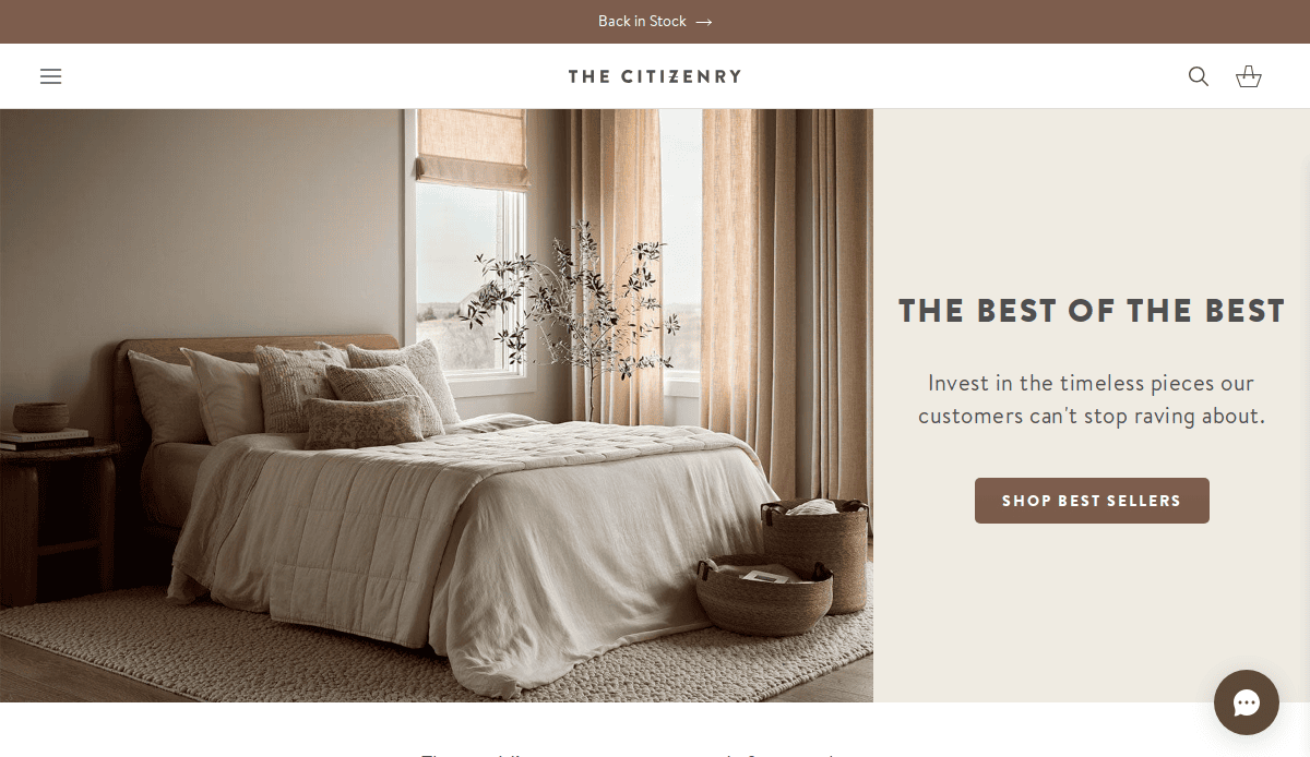 A cozy, sunlit bedroom with a neatly made bed, beige linens, pillows, woven baskets, and large windows. Beside it is text promoting The Best of the Best timeless home pieces with a button to shop best sellers.