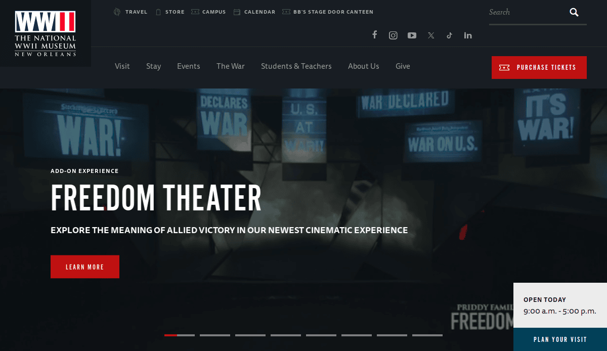 Screenshot of The National WWII Museum website featuring the Freedom Theater exhibit, with large text overlays reading U.S. AT WAR and WAR DECLARED. A sidebar shows opening hours from 9:00 a.m. to 5:00 p.m.