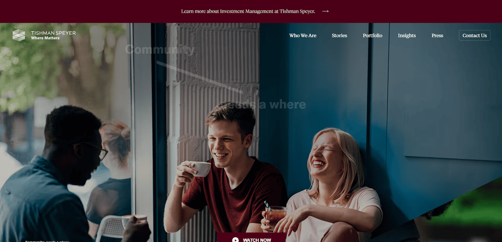Three people sit by a window in a cozy cafe, laughing and enjoying drinks together. Sunlight streams inside, creating a warm and friendly atmosphere. The Tishman Speyer website menu is visible at the top.