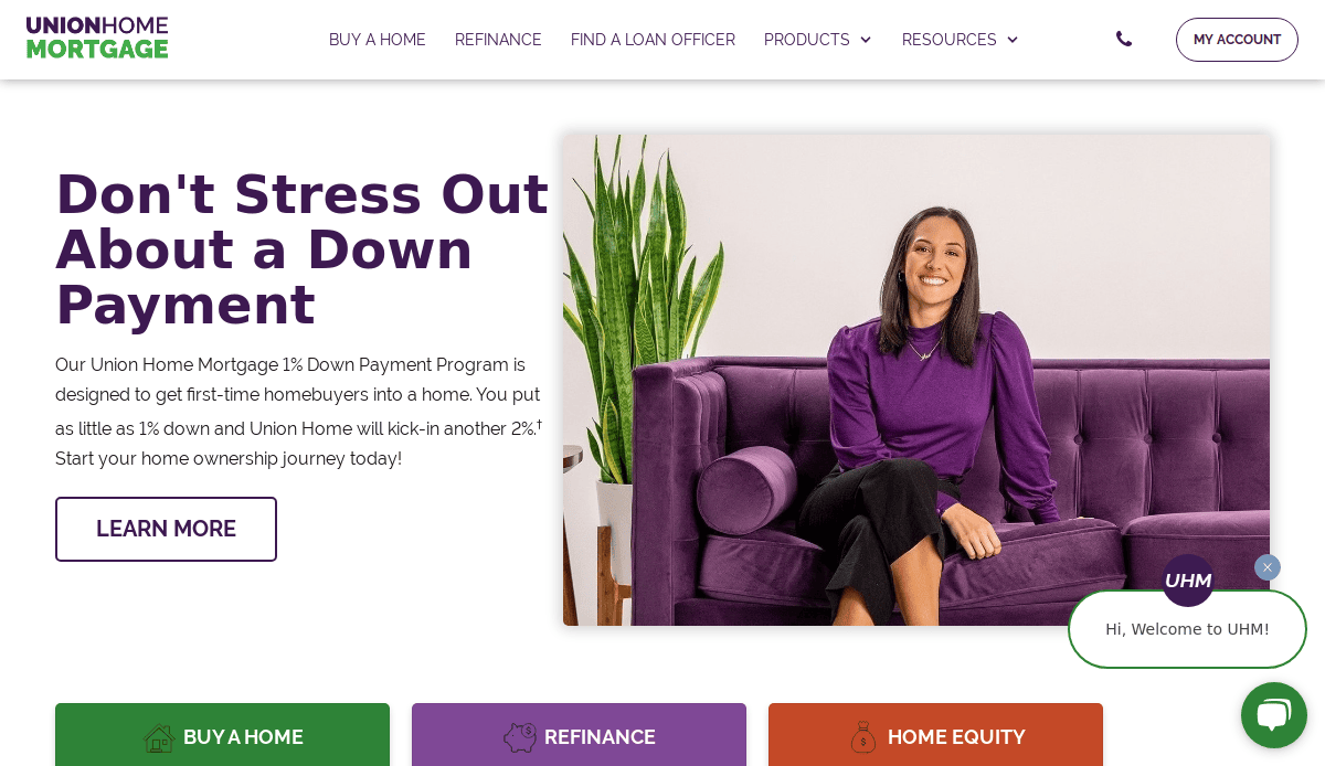 A smiling woman sits on a purple couch in a bright room. Large text reads, “Don’t Stress Out About a Down Payment,” promoting Union Home Mortgage’s down payment program. Website navigation and buttons are visible.
