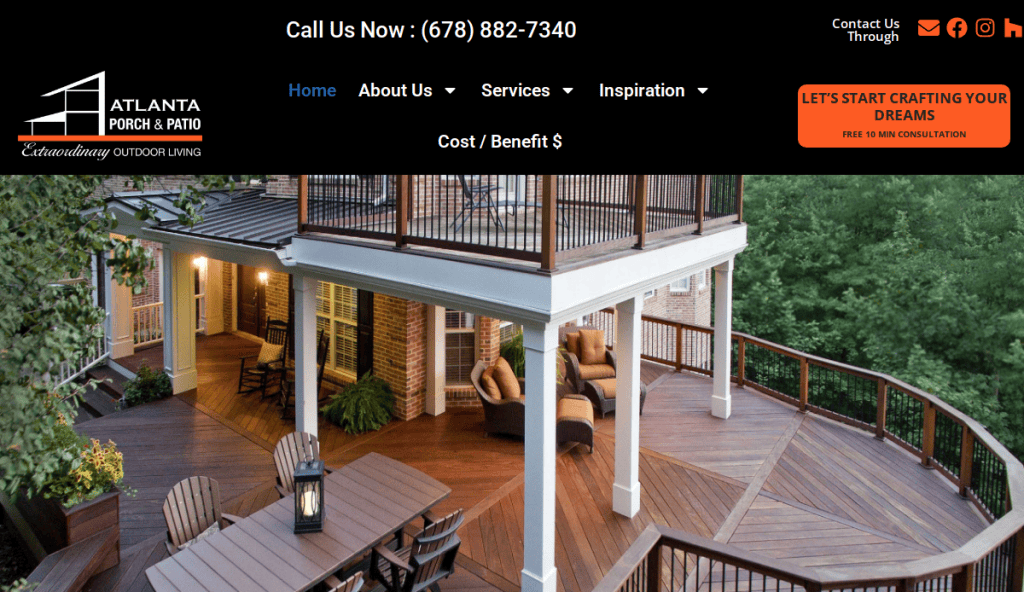 Aerial view of a spacious, multi-level wood deck with seating and dining areas, surrounded by lush trees, featured on Atlanta Porch & Patio’s website. Contact and navigation details are visible at the top.