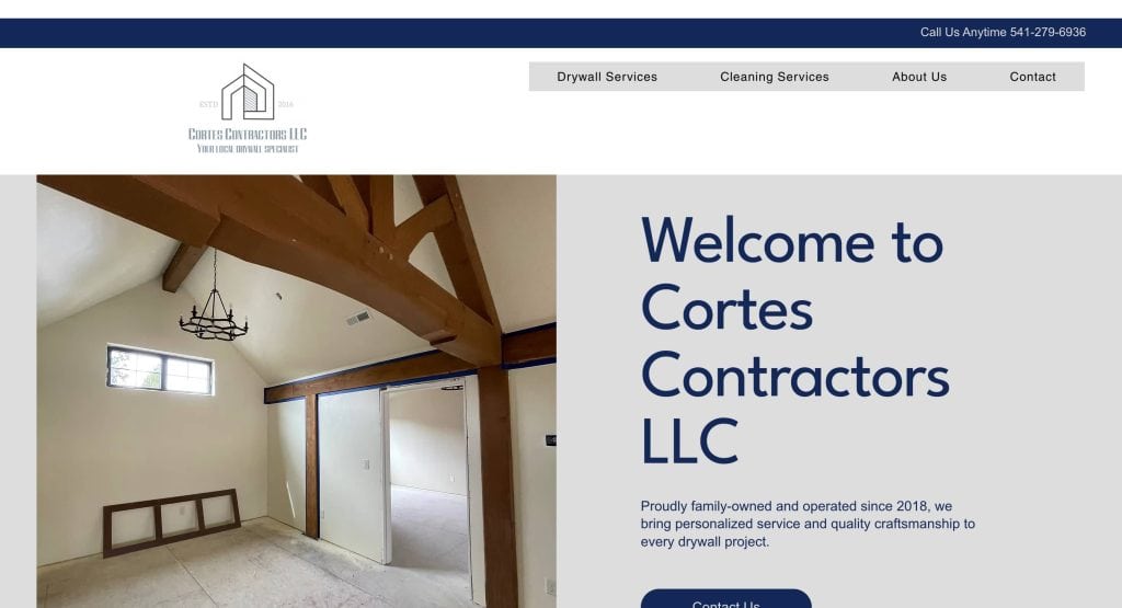 Screenshot of Cortes Contractors LLC’s website homepage, showing an image of an unfinished room with wooden beams and a welcome message introducing the company. The menu has links to services, about, and contact.