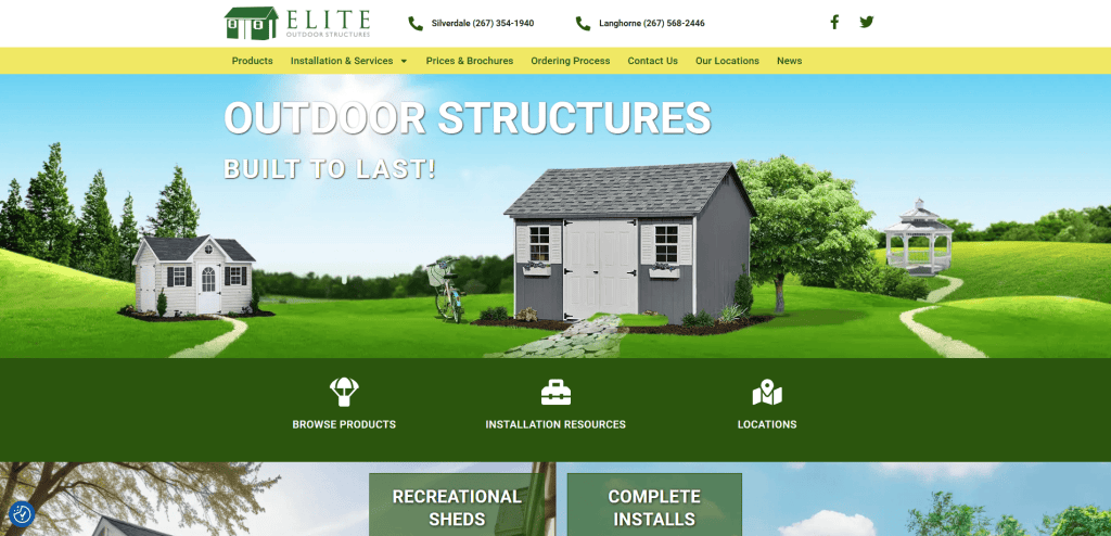 Website homepage for Elite Outdoor Structures featuring a light gray shed on green grass with a blue sky background. Navigation menu and contact info appear at the top, and large text reads OUTDOOR STRUCTURES BUILT TO LAST!.