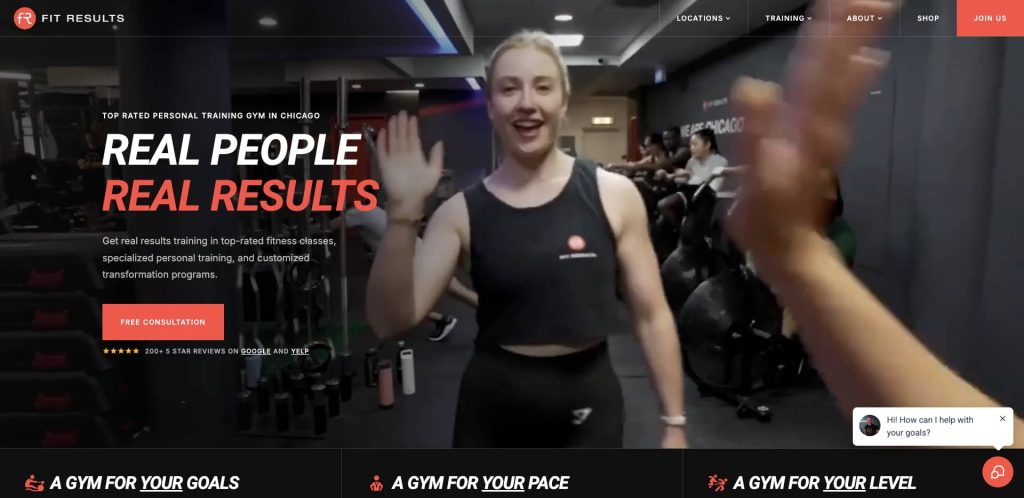 A smiling woman in workout clothes gives a high-five to the camera in a gym, with people exercising in the background. The text overlay reads Real People, Real Results at Fit Results gym.