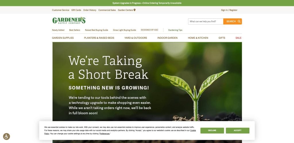 A website page from Gardener’s Supply Company displays a message: Were Taking a Short Break with a sprouting plant image, indicating they are temporarily pausing orders to upgrade their system.