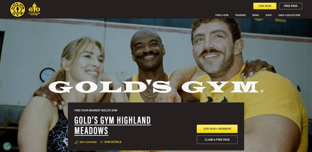 Three people in workout clothes smile and pose together inside a gym, standing in front of weightlifting equipment. The Gold’s Gym logo and website navigation bar are visible at the top of the image.