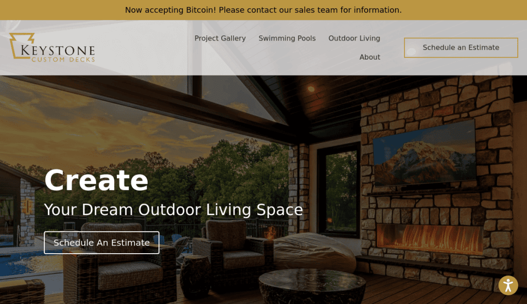 A modern outdoor living space with a stone fireplace, mounted TV, cozy seating, and large windows overlooking a sunset-lit yard. Website banner reads, Create Your Dream Outdoor Living Space.