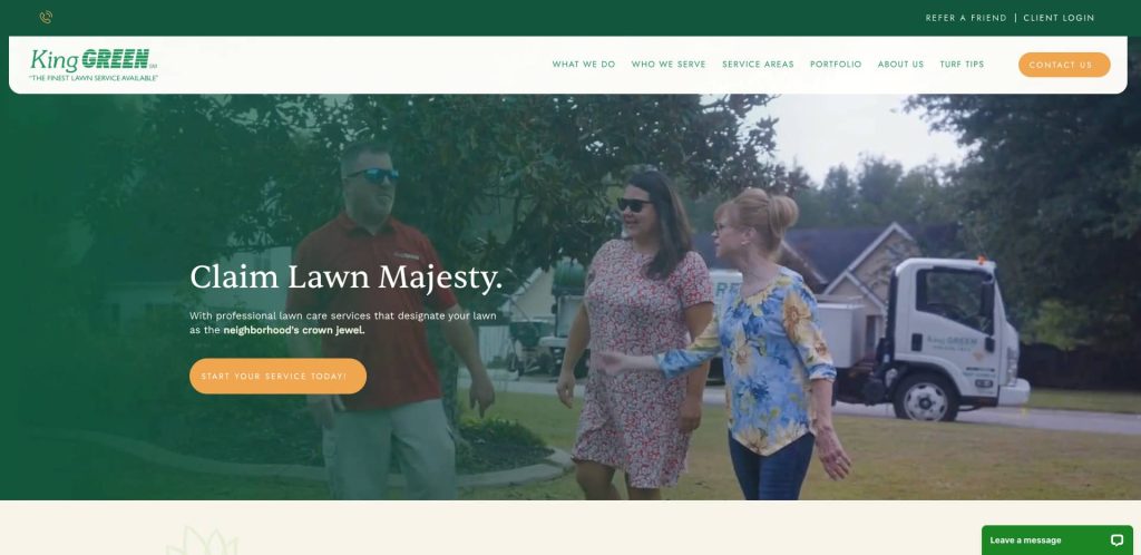 Three people walk and talk on a green lawn in a suburban neighborhood. A King GREEN service truck and houses are visible in the background. The website advertises professional lawn care services.