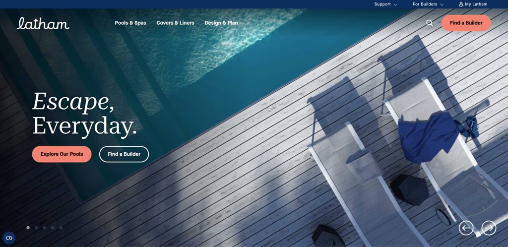 A sunlit pool with clear blue water beside a wooden deck featuring two lounge chairs casting shadows. White text reads, “Escape, Everyday.” Buttons say “Explore Our Pools” and “Find a Builder.”.