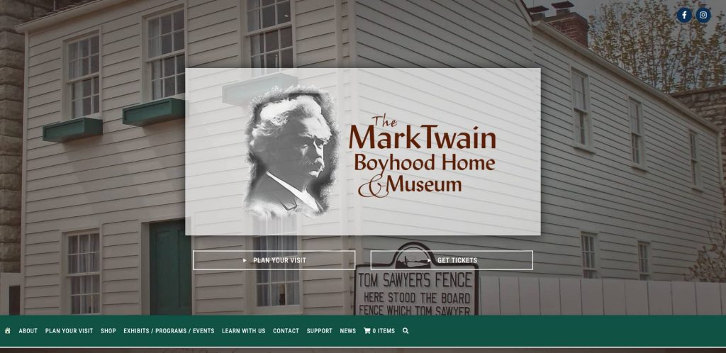 Website homepage for The Mark Twain Boyhood Home & Museum, featuring a large logo with Mark Twain’s portrait, building in the background, and navigation menu at the bottom. “Tom Sawyer’s Fence” sign is partially visible.