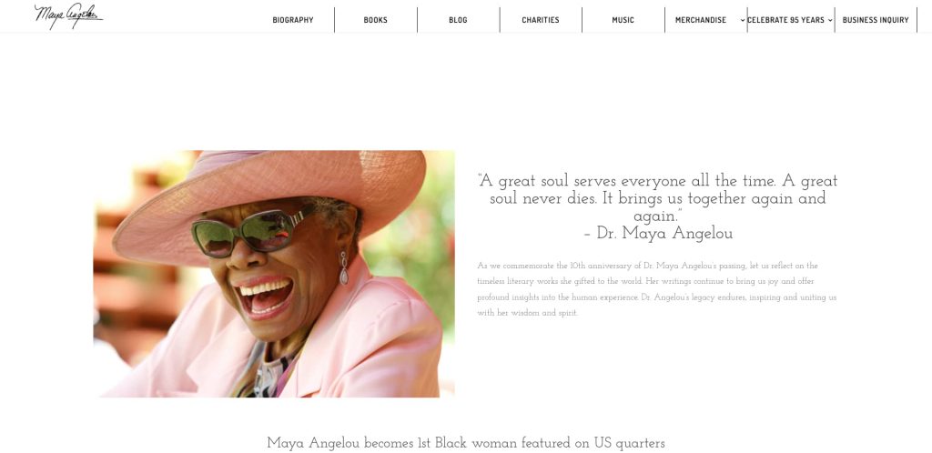 An older woman in a pink hat and sunglasses smiles widely, showing her teeth. She wears a pink outfit and pearl necklace, and sits outside with greenery in the blurred background.