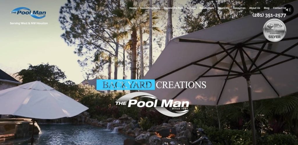 A backyard pool scene with large white umbrellas, palm trees, and a rock waterfall. The Pool Man logo and contact information are displayed over the image, along with the text “Backyard Creations.”.