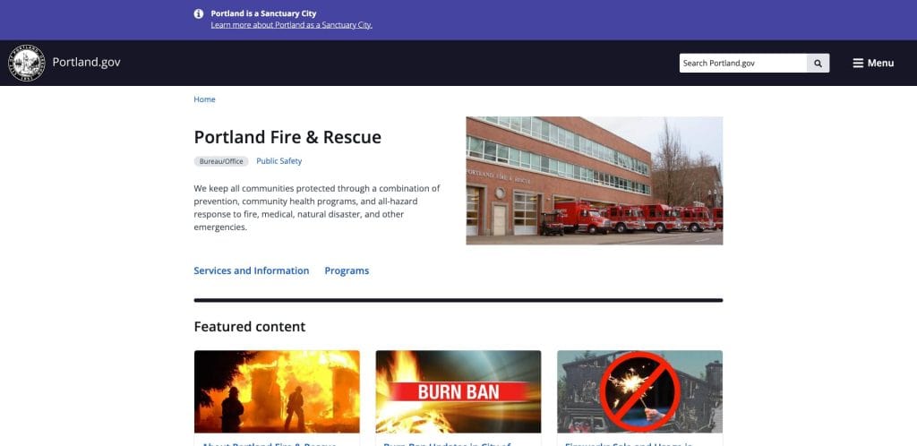 Screenshot of the Portland Fire & Rescue webpage featuring a building with fire trucks parked outside, text about community safety, and links to services, programs, and featured content on fire safety.
