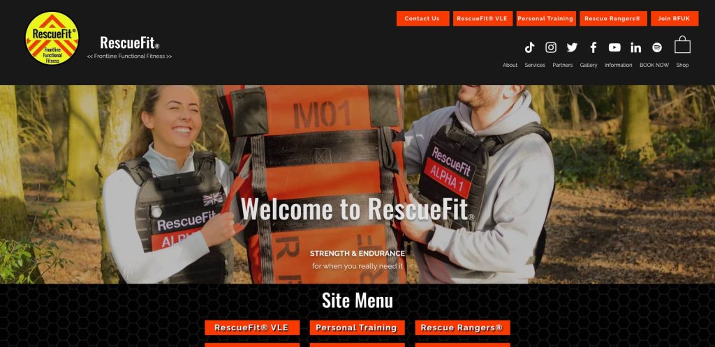 Two people in RescueFit vests smile while lifting orange and black weighted bags outdoors. Text reads Welcome to RescueFit with menu options above and below on a website homepage.