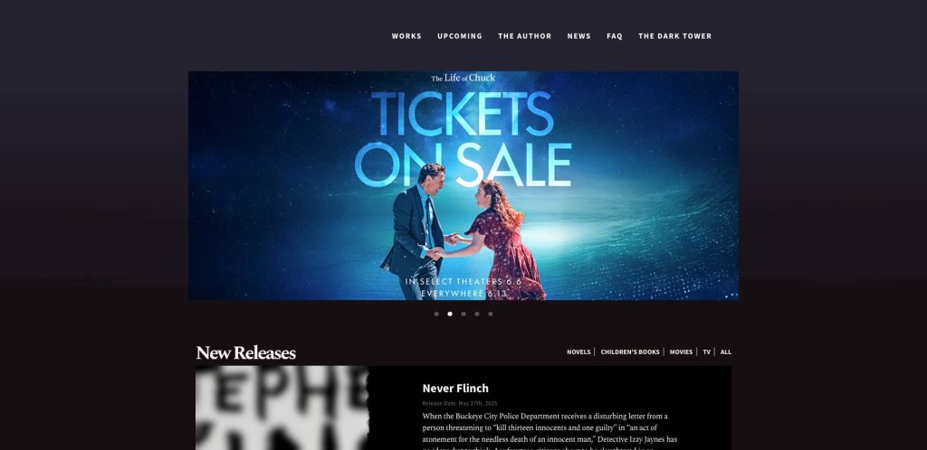 A man in a suit and a woman in a red dress hold hands on a stage under blue light. Large text reads “Tickets On Sale.” The website menu and sections for works, news, and new releases are visible.