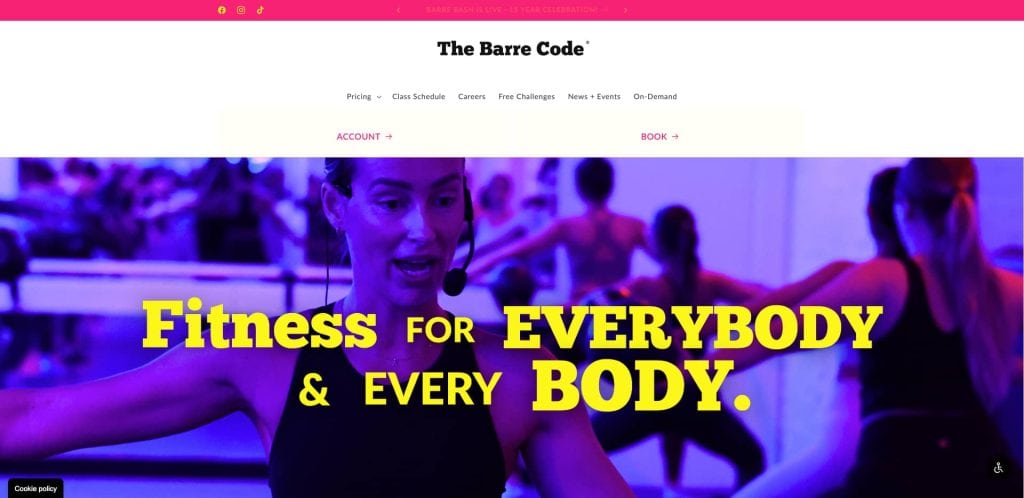 A fitness instructor leads a class with participants in a studio. Bold yellow text on the image reads, Fitness for EVERYBODY & EVERY BODY. The Barre Code website navigation is visible at the top.