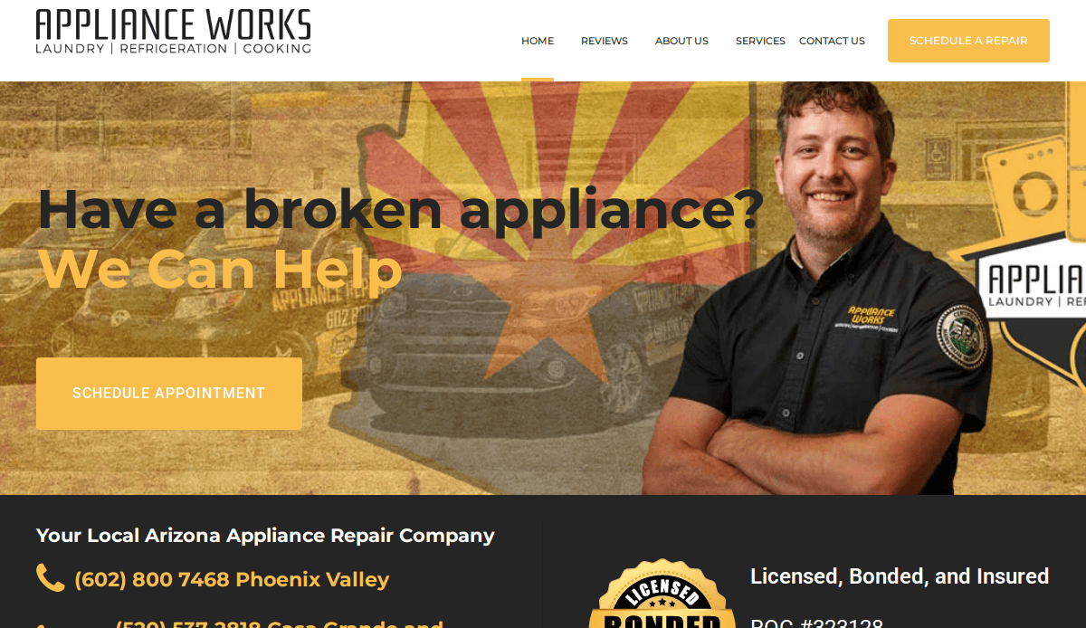 A smiling technician with folded arms stands in front of an Appliance Works logo, showcasing our professional appliance repair service. Yellow text reads, Have a broken appliance? We Can Help. Buttons let you schedule appointments and repairs.