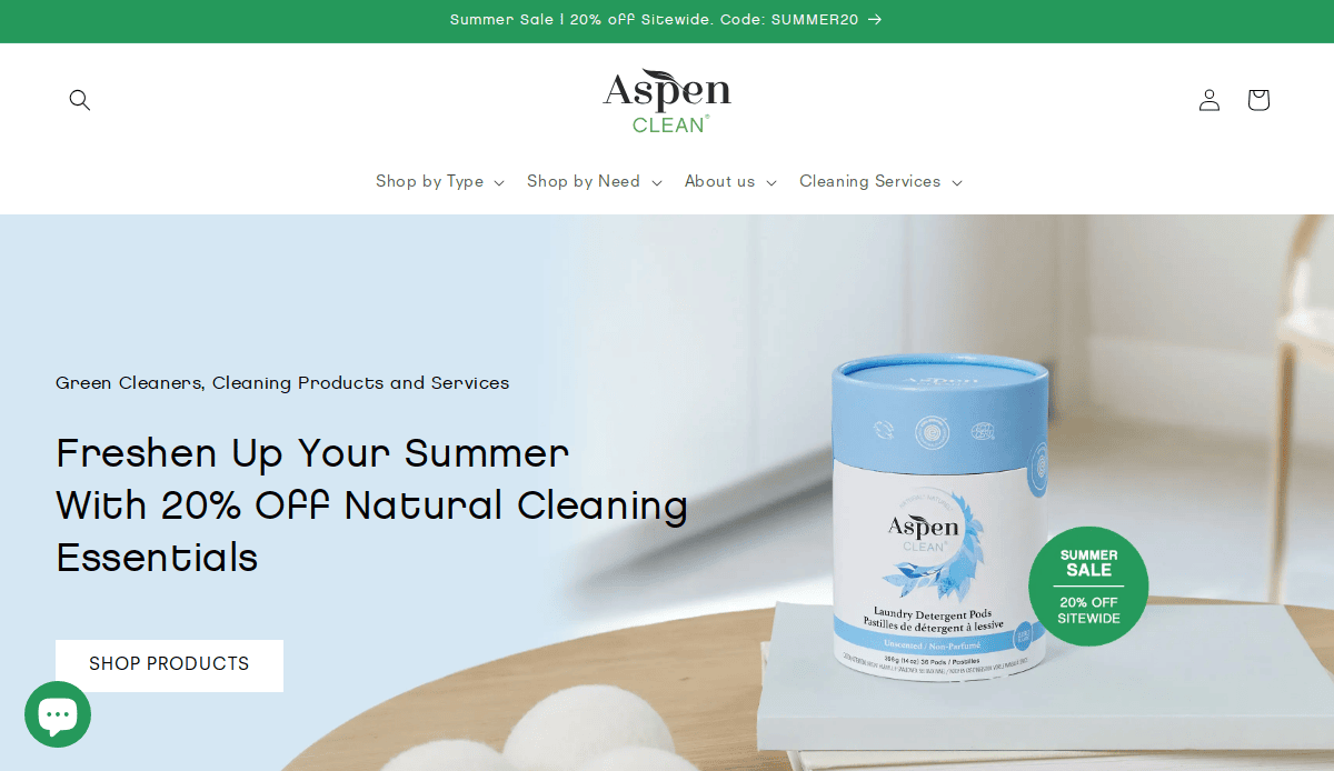 Screenshot of AspenClean website homepage highlighting its fresh website design, with a summer sale banner, laundry detergent powder, and text promoting 20% off natural cleaning essentials. A “Shop Products” button is featured.