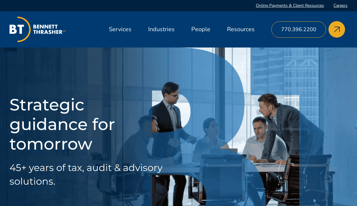 A business meeting with five professionals in a modern office, overlaid with text: Strategic guidance for tomorrow. 45+ years of tax, audit & advisory solutions. A high-impact accountant website design features the Bennett Thrasher logo and navigation menu at the top.