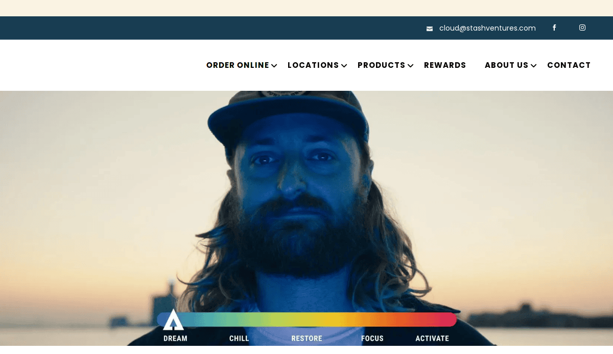 A bearded man in a cap is illuminated by blue light, standing outdoors at sunset. A colorful bar with categories like Dream, Chill, Restore, Focus, and Activate evokes sleek Cannabis website design at the bottom of the image.