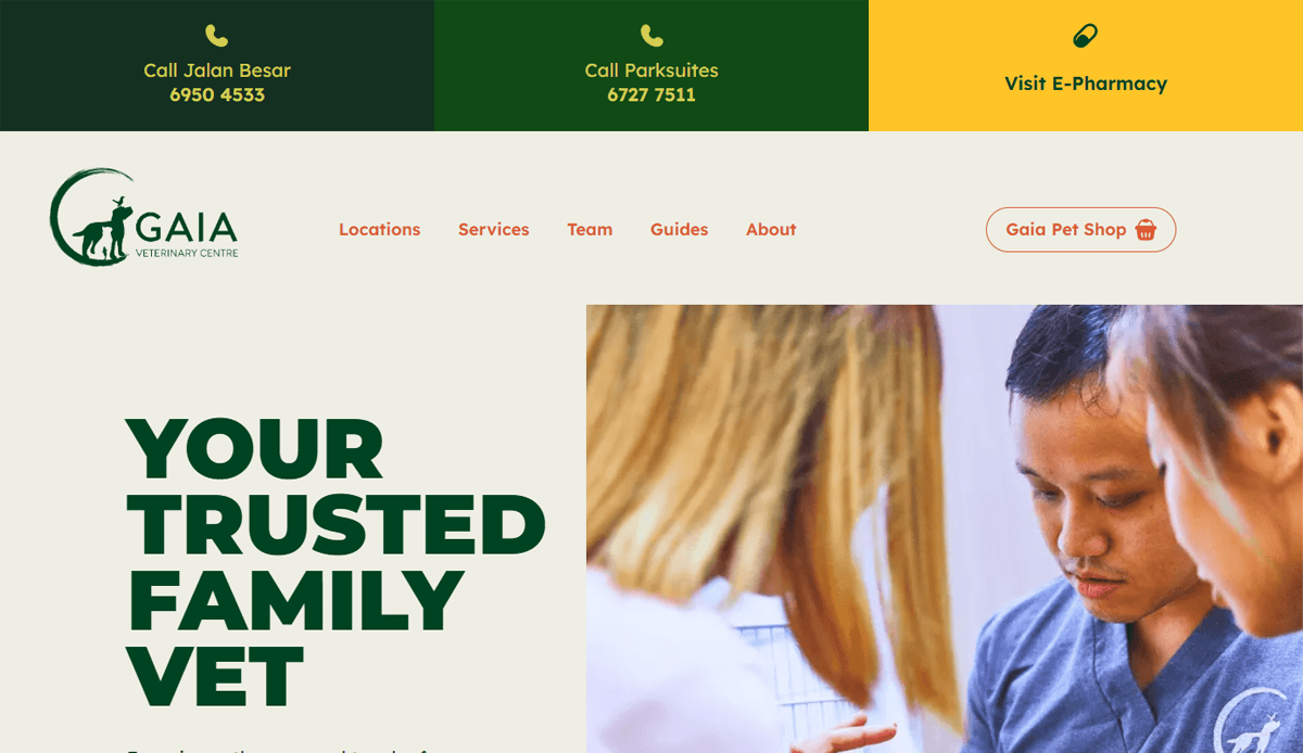 Screenshot of Gaia Veterinary Centre’s professional veterinary website, displaying contact numbers, e-pharmacy link, navigation menu, and a photo of a vet with a pet owner. Large text reads “Your Trusted Family Vet.”.
