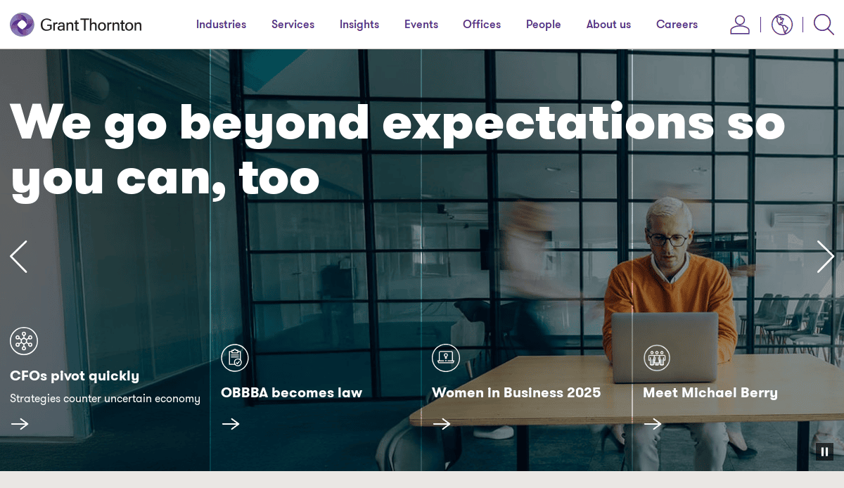 A man in glasses and an orange sweater works on a laptop in a modern glass-walled office. Large text reads, We go beyond expectations so you can, too. Perfect for a high-impact accountant website, with navigation visible at the top.