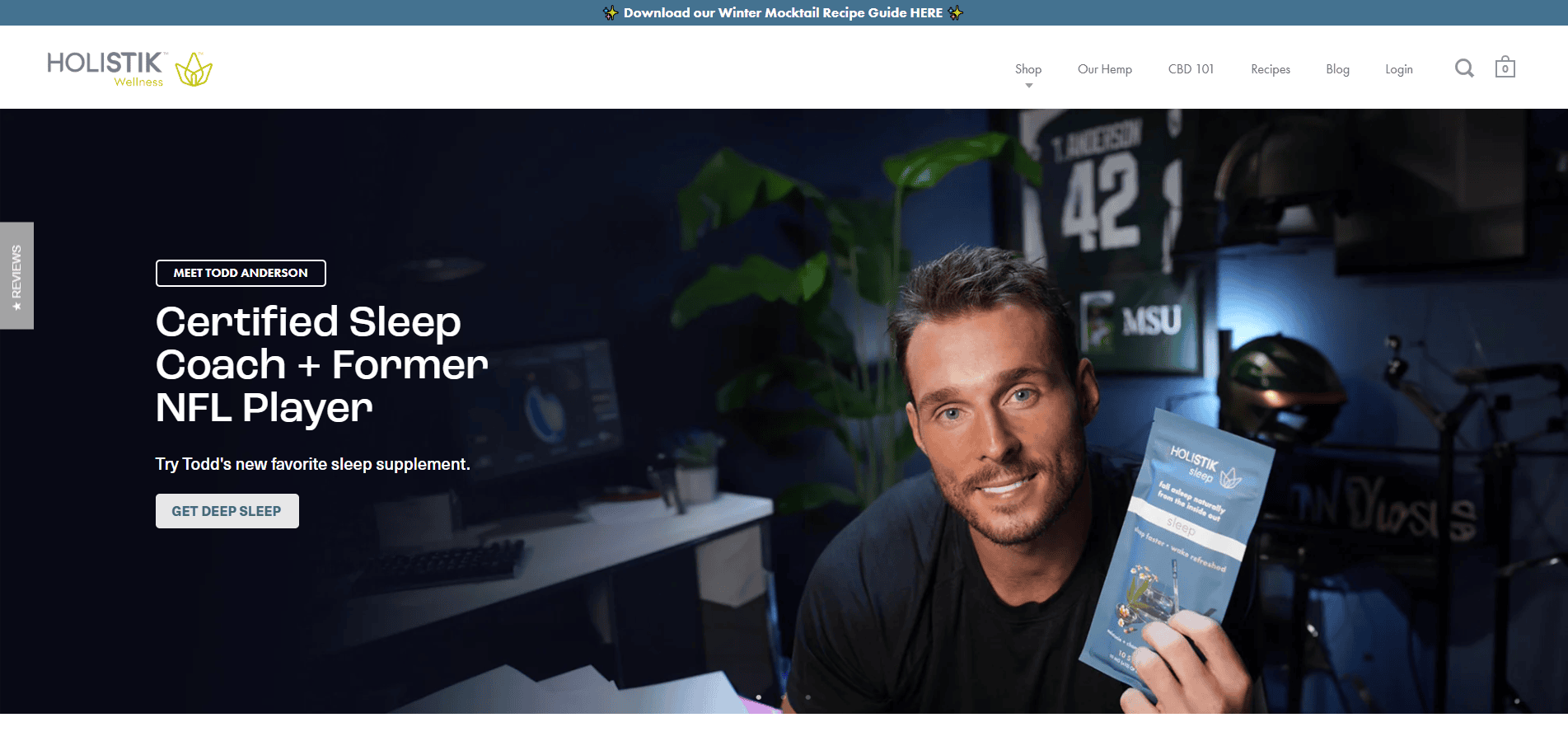 A man sits at a desk holding a Holistik Wellness sleep supplement packet. Text reads “Certified Sleep Coach + Former NFL Player.” Sports memorabilia and a football helmet add flair, perfect for any CBD business or CBD online store promotion.