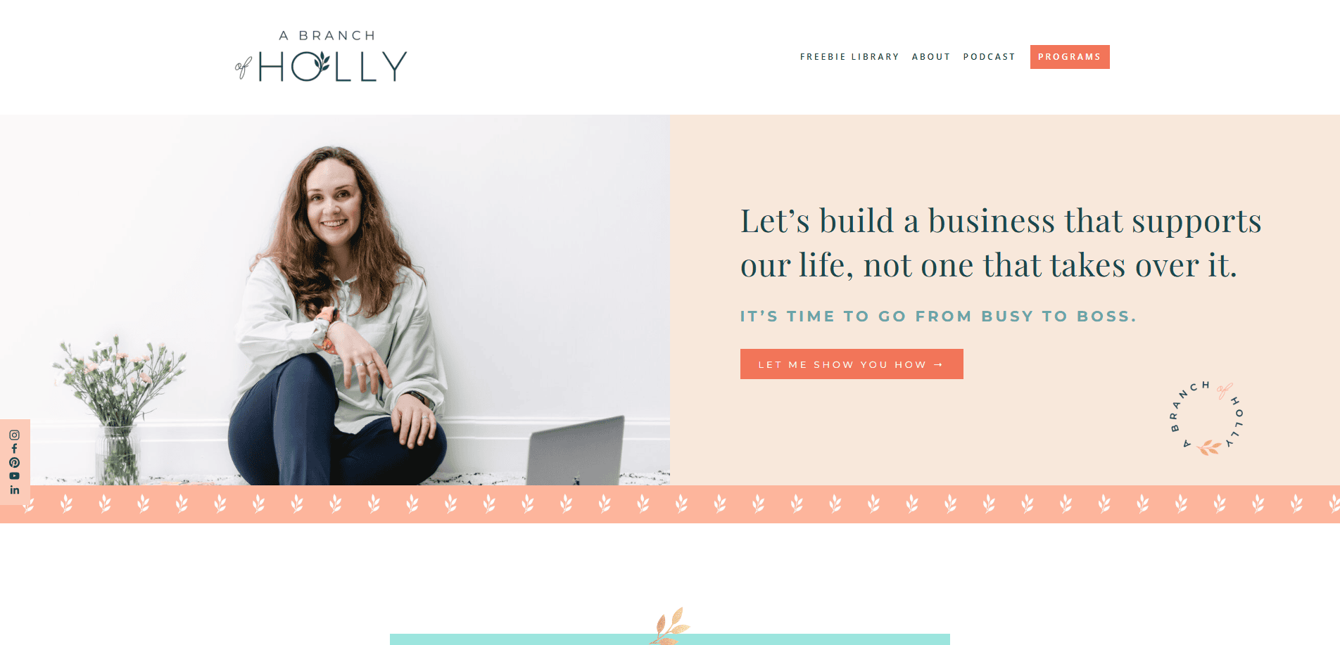 A woman sits cross-legged on the floor smiling beside a laptop and plant. Text reads: Let’s build a coaching website that supports our life, not takes over it. It’s time to go from busy to boss. Website branding: A Branch of Holly.